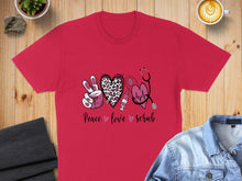 Load image into Gallery viewer, Pink t-shirt with "Peace Love Scrub" text, leopard print heart, stethoscope, and heart monitor.
