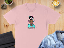 Load image into Gallery viewer, Pink t-shirt with cartoon nurse graphic and "NURSING" text.
