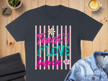 Load image into Gallery viewer, T-shirt with "Teach Love Inspire" text, pink stripes, and flowers.
