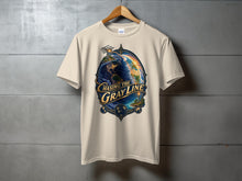 Load image into Gallery viewer, Cream t-shirt with a circular graphic featuring a globe, compass, and text "CHASING THE GRAY LINE".
