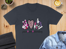 Load image into Gallery viewer, Dark t-shirt with "peace love laboratory" text and science graphics.
