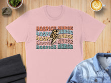 Load image into Gallery viewer, "Hospice Nurse" text with lightning bolt graphic on a pink t-shirt.
