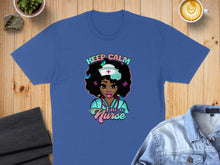 Load image into Gallery viewer, Blue t-shirt with "Keep Calm I'm a Nurse" text and a nurse graphic.
