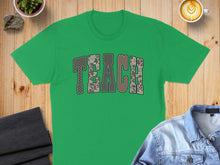 Load image into Gallery viewer, Green t-shirt with "TEACH" in camouflage letters.
