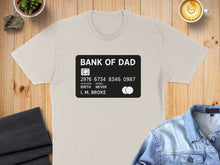 Load image into Gallery viewer, Bank of Dad credit card design on a t-shirt.

