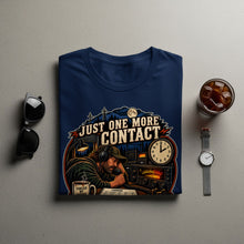 Load image into Gallery viewer, Dark blue t-shirt with a graphic of a man using a ham radio, text "JUST ONE MORE CONTACT".
