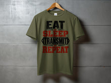 Load image into Gallery viewer, Olive green t-shirt with "EAT SLEEP TRANSMIT REPEAT" text graphic.
