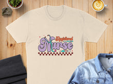 Load image into Gallery viewer, Registered Nurse text with stethoscope and syringes on a t-shirt.
