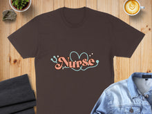Load image into Gallery viewer, Brown t-shirt with "Nurse" in pink retro font and a stethoscope forming a heart.
