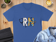 Load image into Gallery viewer, Blue t-shirt with "RN" text made of medical symbols, eyeballs, and spiders.
