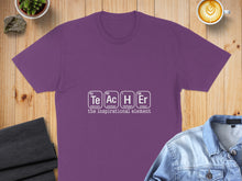 Load image into Gallery viewer, Purple t-shirt with "Teacher" spelled using periodic table elements.
