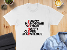 Load image into Gallery viewer, White t-shirt with "FUNNY HANDSOME STRONG HAPPY CLEVER MARVELOUS" in red and black text.
