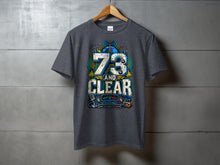Load image into Gallery viewer, Dark grey t-shirt with "73 AND CLEAR" radio graphic and vintage equipment.
