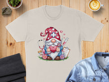 Load image into Gallery viewer, Nurse gnome with stethoscope and heart, holding pills and flowers.
