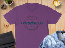 Load image into Gallery viewer, Purple t-shirt with "America" in red and blue, and "Land of the Free, Since 1776, Because of the Brave" text.

