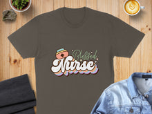Load image into Gallery viewer, Brown t-shirt with "Blessed Nurse" text in colorful retro font.
