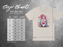 Load image into Gallery viewer, Unisex cotton t-shirt size chart with gnome nurse illustration.
