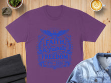 Load image into Gallery viewer, Purple t-shirt with "Faith, Family, Freedom" text in blue.
