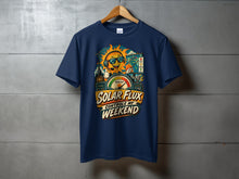 Load image into Gallery viewer, Navy t-shirt with cartoon sun, radio equipment, and text "Solar Flux Controls My Weekend".
