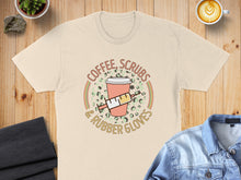 Load image into Gallery viewer, T-shirt graphic with text "COFFEE, SCRUBS &amp; RUBBER GLOVES" and a syringe.
