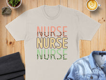 Load image into Gallery viewer, T-shirt with "NURSE" in repeating colorful, leopard-print text.
