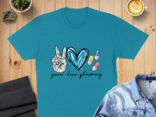 Load image into Gallery viewer, Turquoise t-shirt with "peace love pharmacy" text, peace sign hand, heart, and pills.
