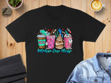 Load image into Gallery viewer, Black t-shirt with colorful cartoon coffee cups and medical items, reading "Intensive Care Nurse".
