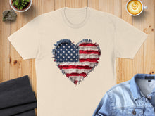Load image into Gallery viewer, Cream t-shirt with distressed American flag heart graphic.

