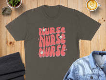 Load image into Gallery viewer, Brown t-shirt with pink "NURSE NURSE NURSE" text and flowers.
