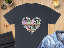Load image into Gallery viewer, Dark t-shirt with "Nurse Life" heart graphic in leopard print and flowers.
