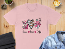 Load image into Gallery viewer, Pink t-shirt with "Peace Love CMA" design featuring leopard print heart, stethoscope, and syringe.
