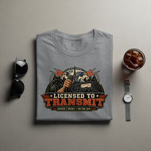 Load image into Gallery viewer, Gray t-shirt with "Licensed to Transmit" graphic featuring radio equipment.
