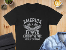 Load image into Gallery viewer, Black t-shirt with "America Land of the Free Home of the Brave" and eagle graphic.
