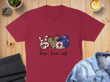 Load image into Gallery viewer, Maroon t-shirt with peace sign, leopard heart, and EMT logo.
