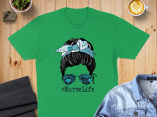 Load image into Gallery viewer, Green t-shirt with messy bun nurse graphic and #NurseLife text.
