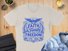 Load image into Gallery viewer, Cream t-shirt with "Faith &amp; Family &amp; Freedom 1776 - 2026" in blue design.
