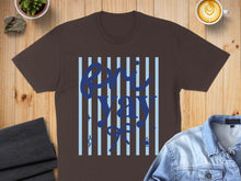 Load image into Gallery viewer, Brown t-shirt with "Eni Yay" text and light blue stripes.
