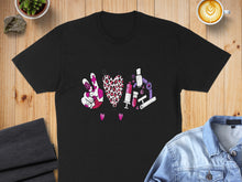 Load image into Gallery viewer, Black t-shirt with peace sign, hearts, microscope, and lab equipment graphic.
