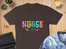 Load image into Gallery viewer, Brown t-shirt with "Registered Nurse" text and medical icons.
