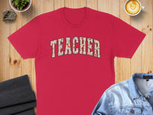 Load image into Gallery viewer, Red t-shirt with "TEACHER" in floral lettering.
