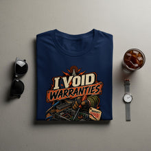 Load image into Gallery viewer, Navy blue t-shirt with "I VOID WARRANTIES" graphic and electronic repair imagery.
