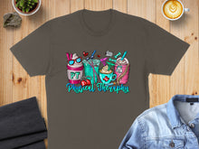 Load image into Gallery viewer, Physical Therapy graphic on a brown t-shirt with drinks and medical icons.
