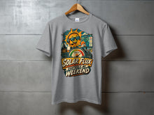 Load image into Gallery viewer, Grey t-shirt with "Solar Flux Controls My Weekend" text and cartoon sun graphic.
