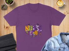 Load image into Gallery viewer, Purple t-shirt with "Nurse" in colorful Halloween-themed lettering.
