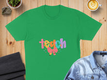 Load image into Gallery viewer, Green t-shirt with "teach" in colorful letters and a pink bow.
