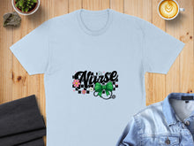 Load image into Gallery viewer, Light blue t-shirt with "Nurse" graphic featuring a stethoscope and green bow.
