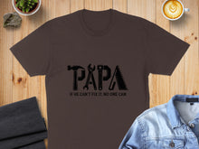 Load image into Gallery viewer, Brown t-shirt with "PAPA" text made of tools and "IF HE CAN'T FIX IT, NO ONE CAN."
