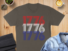 Load image into Gallery viewer, Grey t-shirt with "1776" in red, white, and blue stripes.
