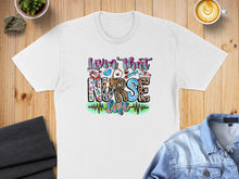 Load image into Gallery viewer, White t-shirt with "Luvin' that Nurse Life" text and medical icons.
