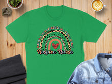 Load image into Gallery viewer, Green t-shirt with "Hospice Nurse" and rainbow heart graphic.
